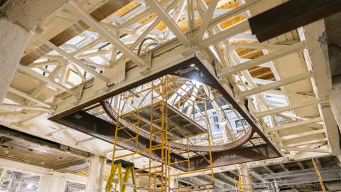 Restoring the historic glass skylight. surrounded by construction