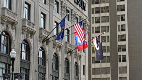 Flags wave outside the Westin Book Cadillac Hotel in downtown Detroit