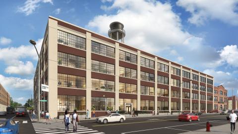 A rendering of a former four-story factory that's now apartments
