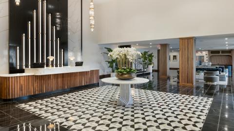 A black and white lobby of a hotel