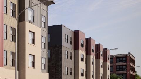 A rendering of a four story apartment building