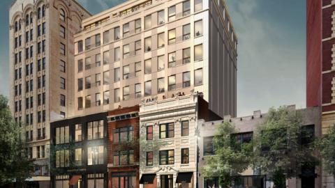 A rendering of a renovated building with a new, lower facade