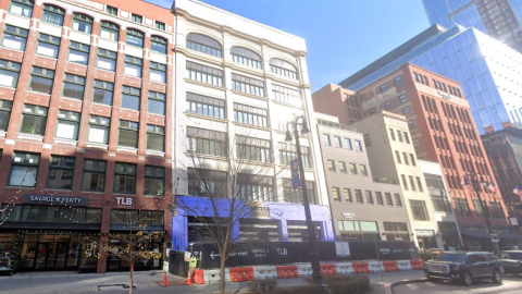 A building in downtown Detroit with the first floor under construction